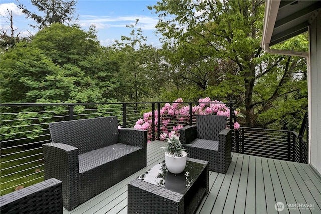 wooden deck featuring an outdoor living space