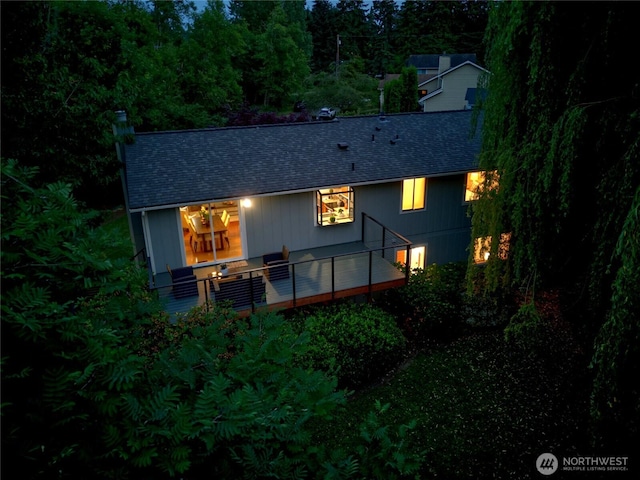 6309 115th Ct SE, Bellevue, WA 98006 - back of house featuring a shingled roof and a chimney