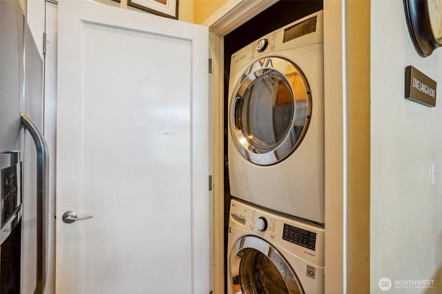 1705 Dock St Unit 520, Tacoma, WA 98402 - laundry room with stacked washer / drying machine