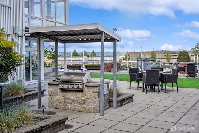 1705 Dock St Unit 520, Tacoma, WA 98402 - view of patio / terrace featuring outdoor dining area