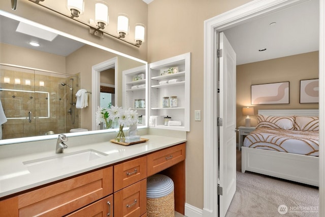 full bath with a shower stall, ensuite bath, and vanity