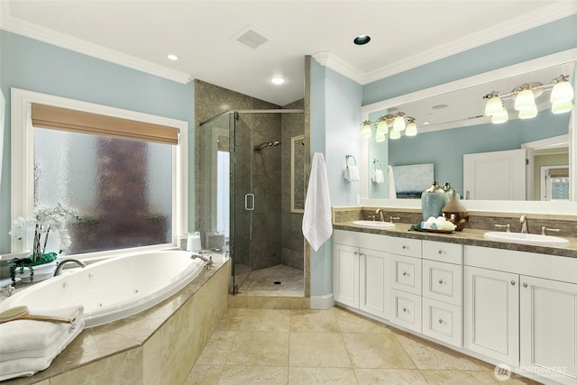 bathroom with crown molding, a whirlpool tub, a shower stall, double vanity, and tile patterned flooring
