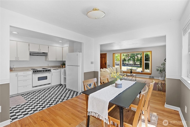 1510 N Mason Ave, Tacoma, WA 98406 - dining space featuring light wood-style flooring and baseboards