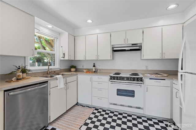 1510 N Mason Ave, Tacoma, WA 98406 - kitchen featuring white appliances, under cabinet range hood, a sink, light floors, and light countertops