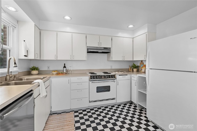 1510 N Mason Ave, Tacoma, WA 98406 - kitchen featuring white appliances, under cabinet range hood, a sink, light flooring, and light countertops