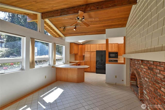 kitchen featuring black appliances, a peninsula, light tile patterned flooring, brown cabinets, and wooden ceiling