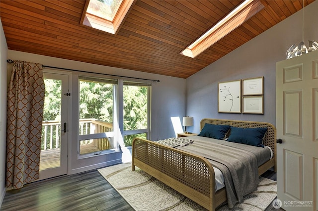 bedroom featuring a skylight, vaulted ceiling, access to exterior, wood ceiling, and dark wood-type flooring