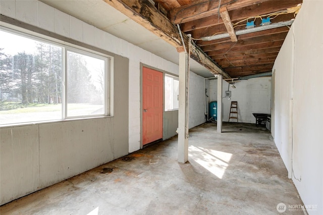 basement with a water pressure tank