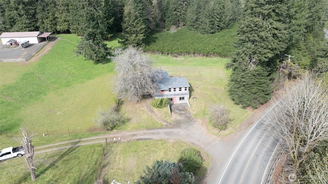 aerial view of property and surrounding area featuring rural landscape