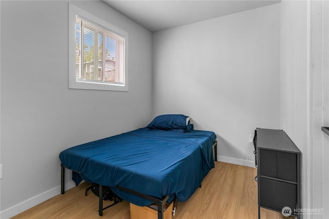 810 SW 124th St, Burien, WA 98146 - bedroom with light wood-type flooring and baseboards