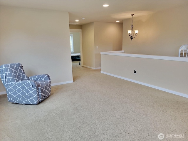 unfurnished room featuring carpet floors, a chandelier, recessed lighting, and baseboards