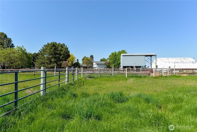3579 NW Dodson Rd, Ephrata, WA 98823 - view of yard featuring an outbuilding, a view of rural / pastoral area, and an exterior structure