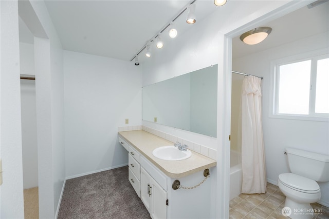 3579 NW Dodson Rd, Ephrata, WA 98823 - bathroom with vanity, shower / bathtub combination with curtain, toilet, and baseboards