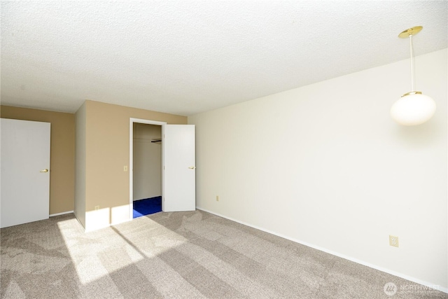 3579 NW Dodson Rd, Ephrata, WA 98823 - unfurnished bedroom featuring carpet floors, a textured ceiling, and a closet