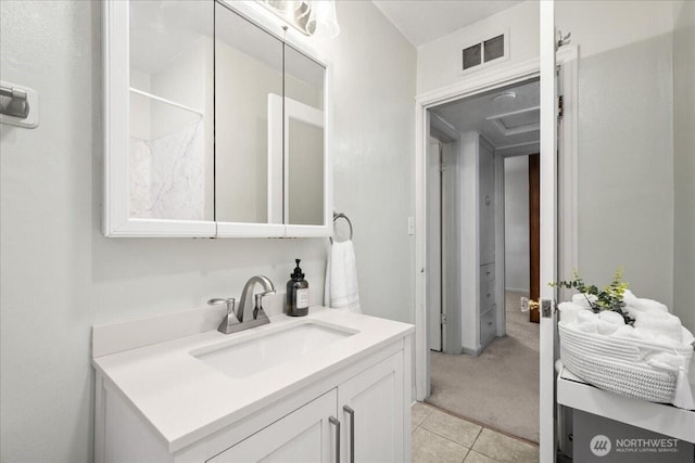 bathroom featuring vanity and tile patterned floors