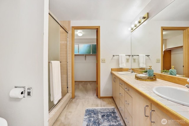 8840 NE 24th St, Clyde Hill, WA 98004 - full bathroom with a shower stall, double vanity, and a spacious closet