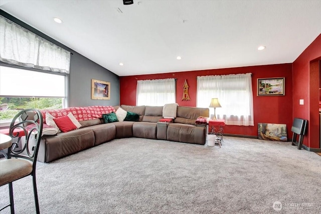 living room featuring carpet flooring, lofted ceiling, and recessed lighting