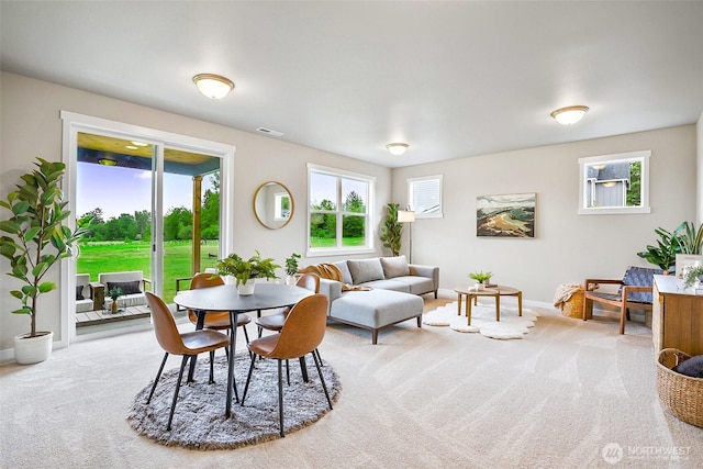17711 11th Ave NE, Arlington, WA 98223 - carpeted dining area featuring baseboards
