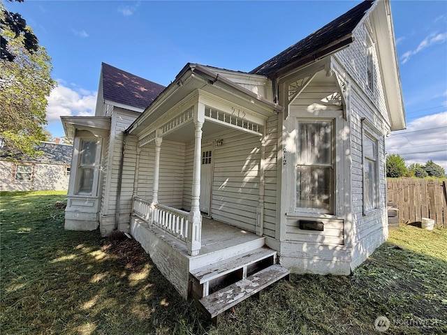 212 N 4th St, Dayton, WA 99328 - back of property with fence and a shingled roof