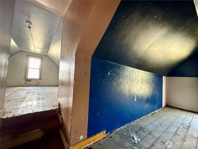 212 N 4th St, Dayton, WA 99328 - additional living space with vaulted ceiling and wood-type flooring