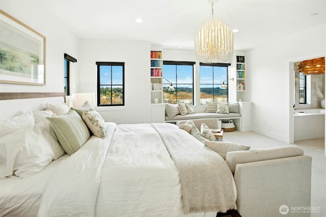 bedroom with a chandelier, recessed lighting, baseboards, and carpet flooring