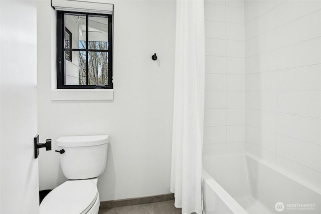 full bathroom with baseboards and toilet