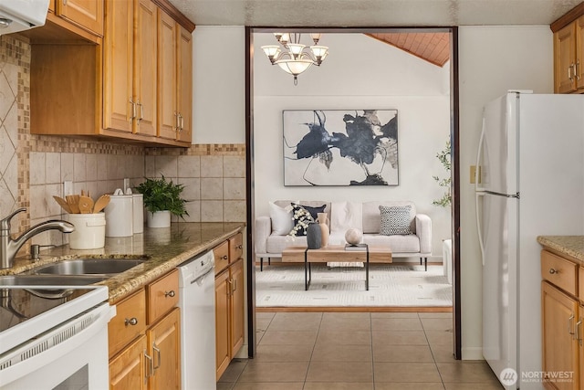23516 20th Ave W, Bothell, WA 98021 - kitchen with white appliances, backsplash, light tile patterned floors, a chandelier, and a sink