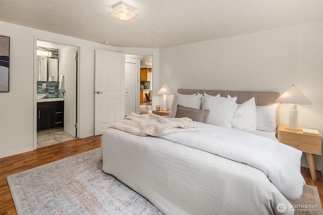 23516 20th Ave W, Bothell, WA 98021 - bedroom with wood finished floors and ensuite bath