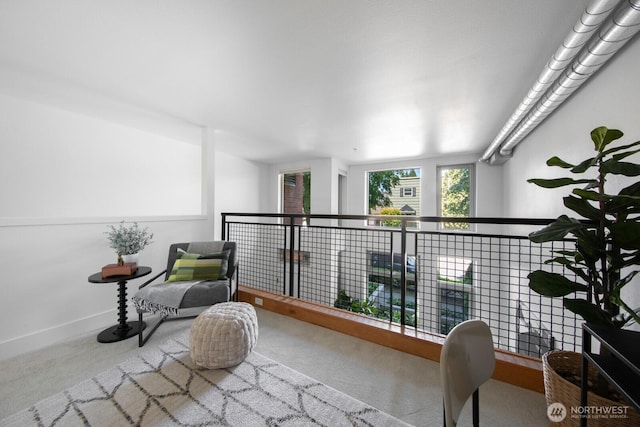 530 Broadway E Unit 124, Seattle, WA 98102 - sitting room with carpet flooring and baseboards