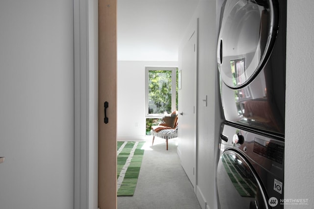 530 Broadway E Unit 124, Seattle, WA 98102 - laundry area with estacked washer and dryer and carpet