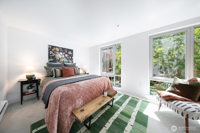 530 Broadway E Unit 124, Seattle, WA 98102 - bedroom with carpet flooring, baseboards, and a baseboard radiator