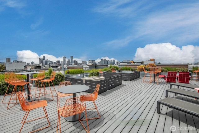 530 Broadway E Unit 124, Seattle, WA 98102 - wooden terrace with a view of skyline