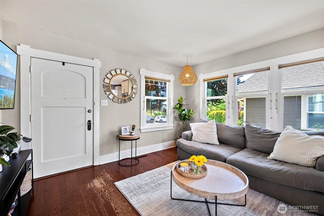 6311 46th Ave SW, Seattle, WA 98136 - living room featuring plenty of natural light, wood finished floors, and baseboards