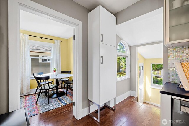 6311 46th Ave SW, Seattle, WA 98136 - entrance foyer with dark wood finished floors, baseboards, and vaulted ceiling