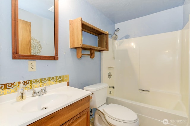 6605 Cooper Point Rd NW, Olympia, WA 98502 - bathroom with vanity, toilet, and shower / bath combination