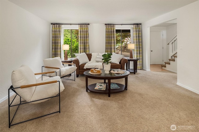19924 31st Dr SE, Bothell, WA 98012 - living area featuring healthy amount of natural light, stairs, and baseboards