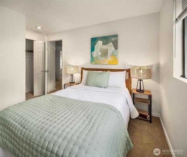 19924 31st Dr SE, Bothell, WA 98012 - carpeted bedroom with baseboards, a closet, and recessed lighting