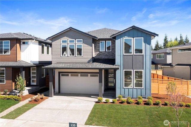 view of front of house featuring board and batten siding, a garage, driveway, and a shingled roof