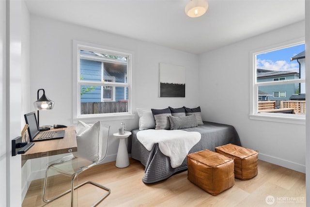 4257 33rd Ave W, Seattle, WA 98199 - bedroom featuring wood finished floors and baseboards