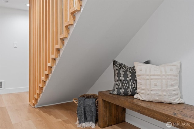 4257 33rd Ave W, Seattle, WA 98199 - stairs featuring wood finished floors and baseboards