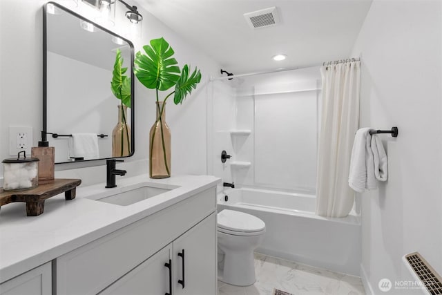 4257 33rd Ave W, Seattle, WA 98199 - full bathroom featuring shower / bath combo with shower curtain, toilet, marble look tile flooring, vanity, and recessed lighting