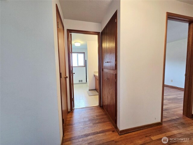 810 H St, Forks, WA 98331 - hall featuring light wood finished floors and baseboards