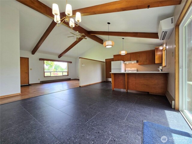810 H St, Forks, WA 98331 - kitchen with white appliances, an AC wall unit, open floor plan, under cabinet range hood, and beam ceiling