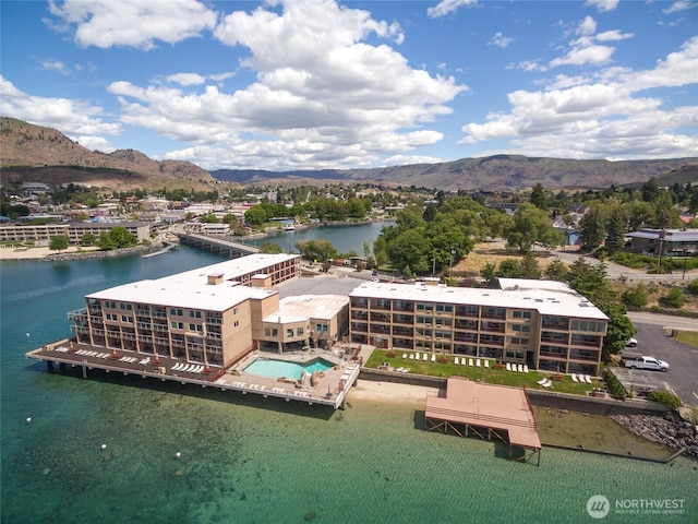 322 W Woodin Ave Unit 711, Chelan, WA 98816 - drone / aerial view of a water and mountain view and a pool