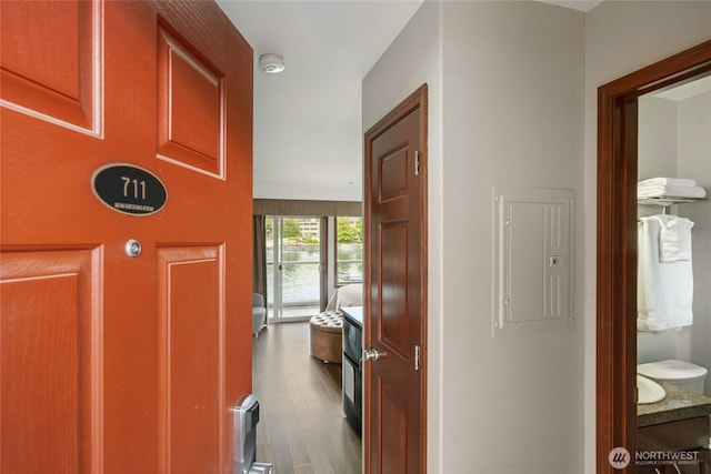 322 W Woodin Ave Unit 711, Chelan, WA 98816 - corridor with electric panel and wood finished floors