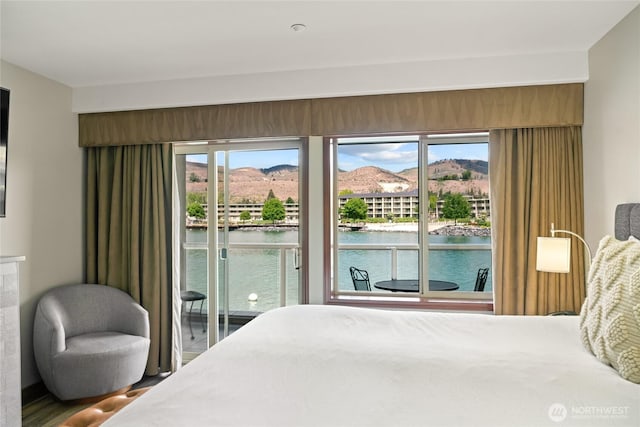 322 W Woodin Ave Unit 711, Chelan, WA 98816 - bedroom with a water and mountain view and access to exterior