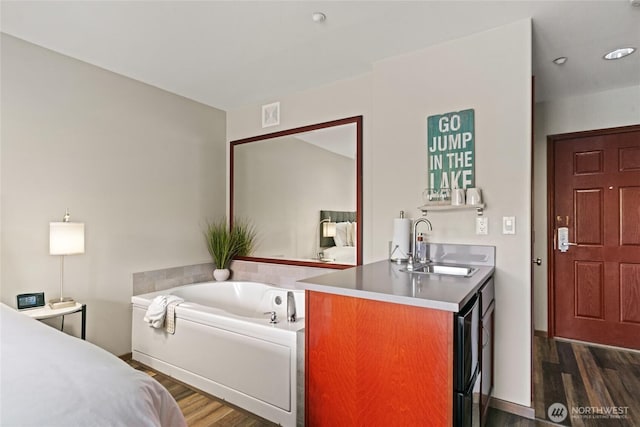 322 W Woodin Ave Unit 711, Chelan, WA 98816 - bedroom featuring dark wood finished floors and a sink