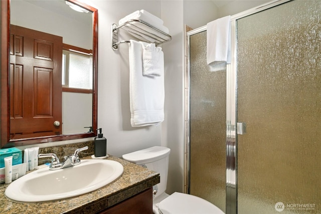 322 W Woodin Ave Unit 711, Chelan, WA 98816 - full bathroom featuring vanity, a shower stall, and toilet