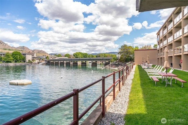 322 W Woodin Ave Unit 711, Chelan, WA 98816 - dock with a water and mountain view and a lawn