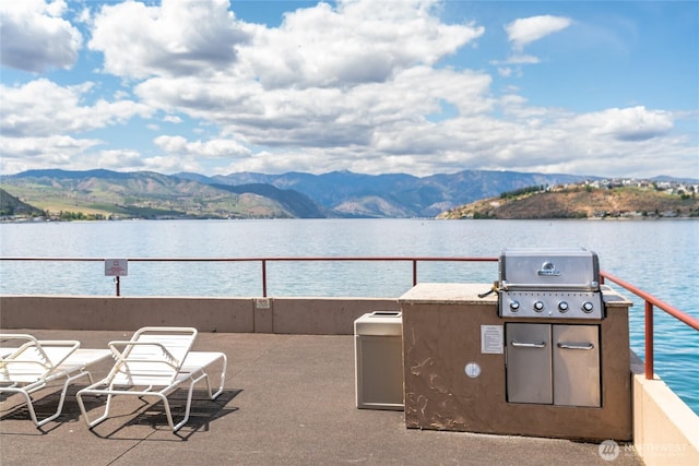 322 W Woodin Ave Unit 711, Chelan, WA 98816 - view of patio with area for grilling and a water and mountain view